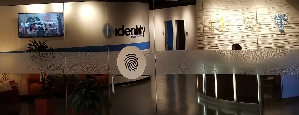 Office wall decorated with custom, bold, dimensional interior graphics and branding.