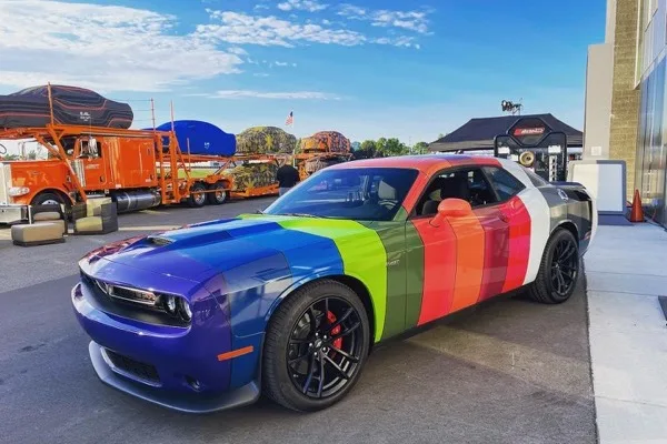 A Dodge Challenger finished in a multi-color block wrap